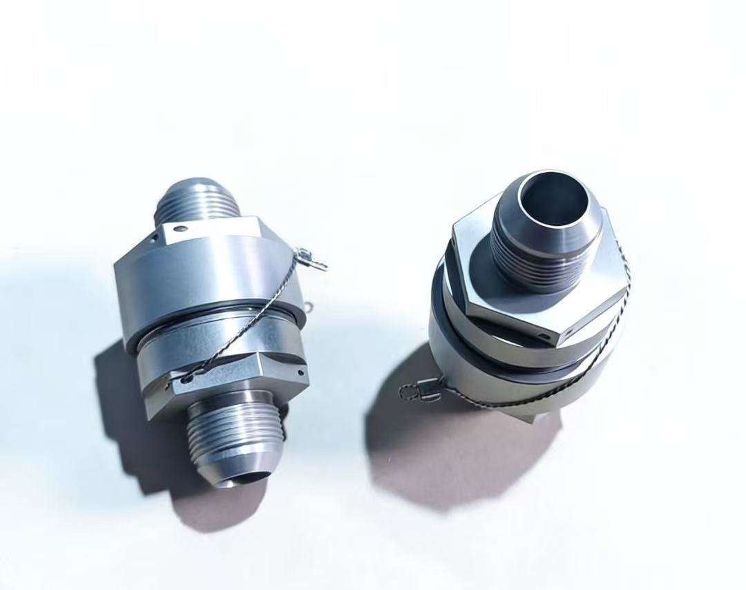 Precision CNC machined threaded fitting and adapter